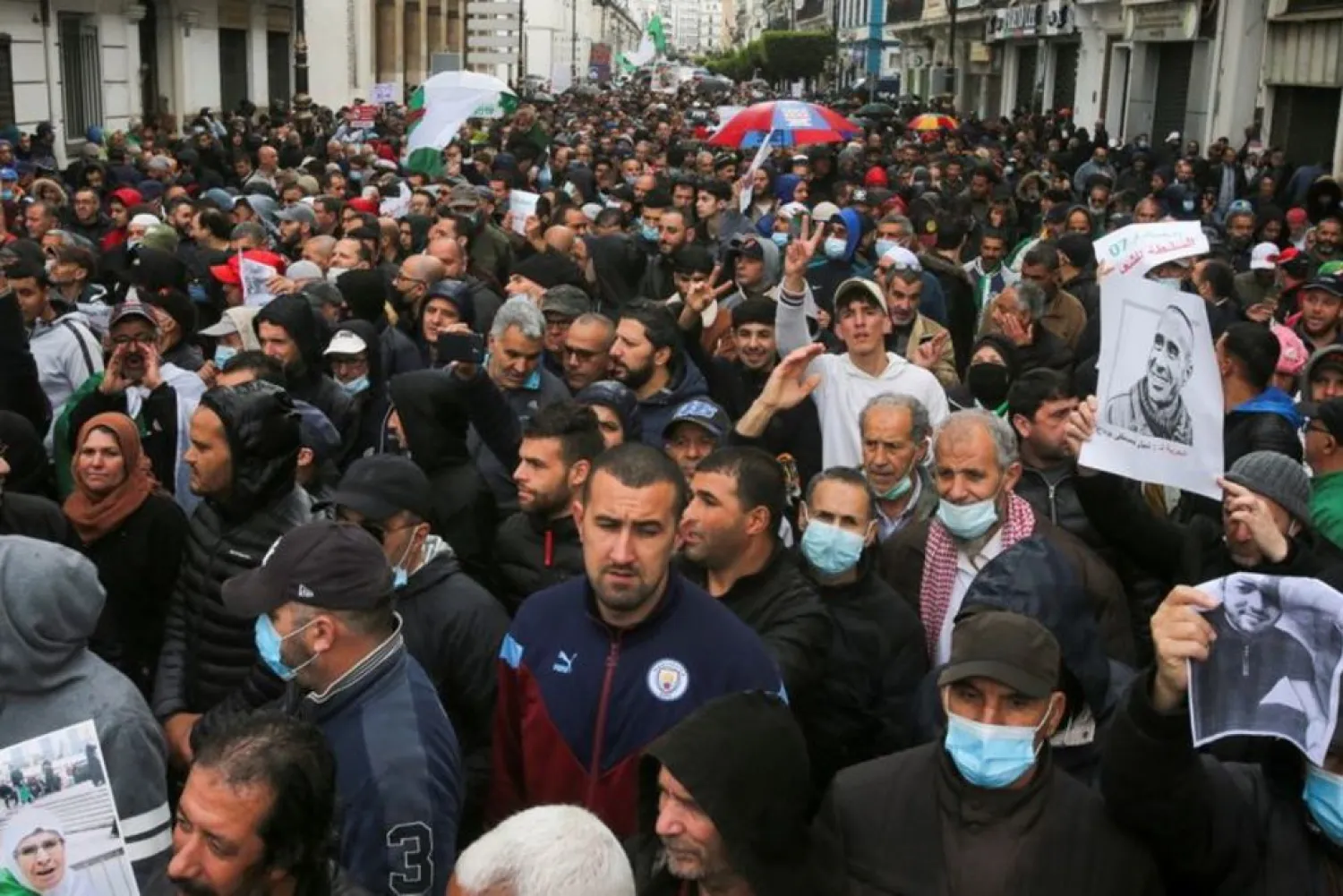 Demonstrators march during a protest demanding political change, in Algiers, Algeria April 16, 2021. (Reuters)