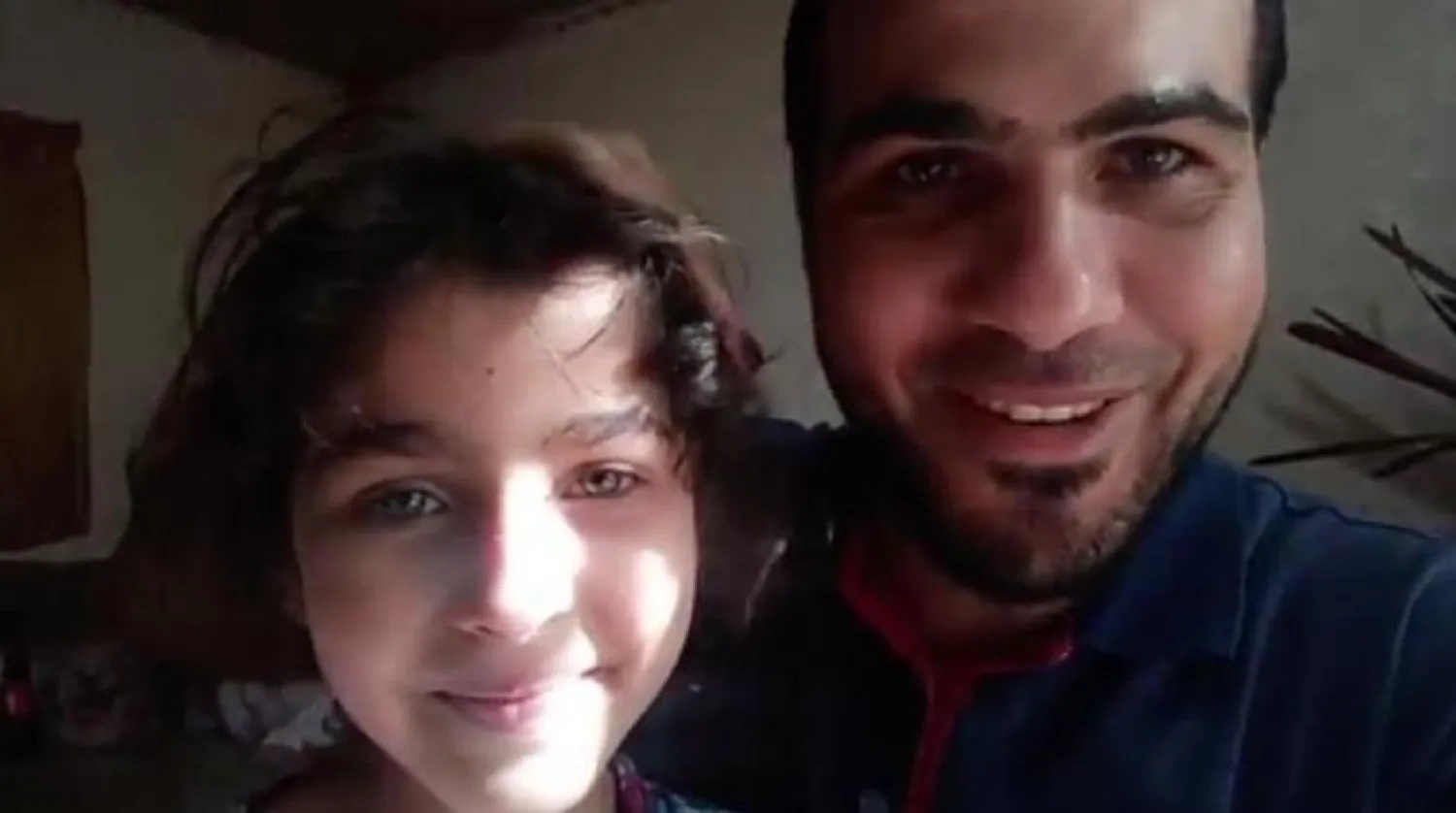 Filistinli baba Ahmed el- Mansi ve kızının bir videosu (The Independent)