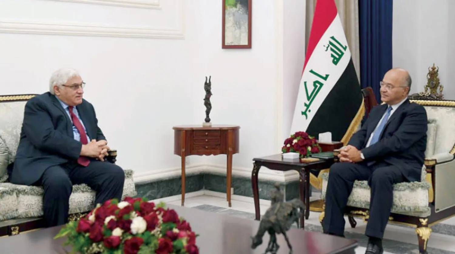 صالح مستقبلا سكرتير الحزب الشيوعي العراقي أمس (واع)