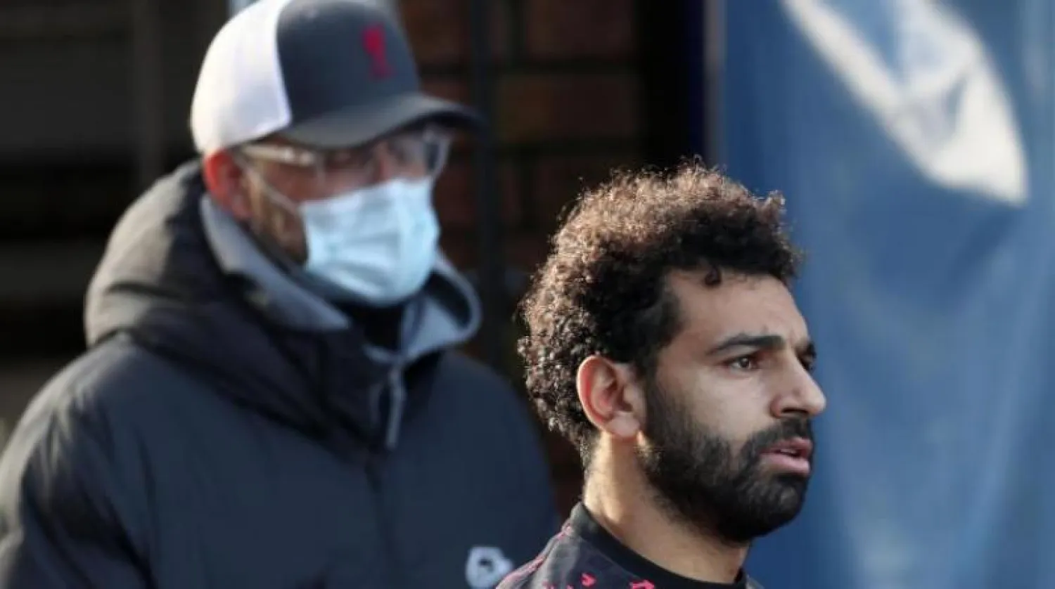 مدرب ليفربول يورغن كلوب واللاعب المصري محمد صلاح (أ.ب)