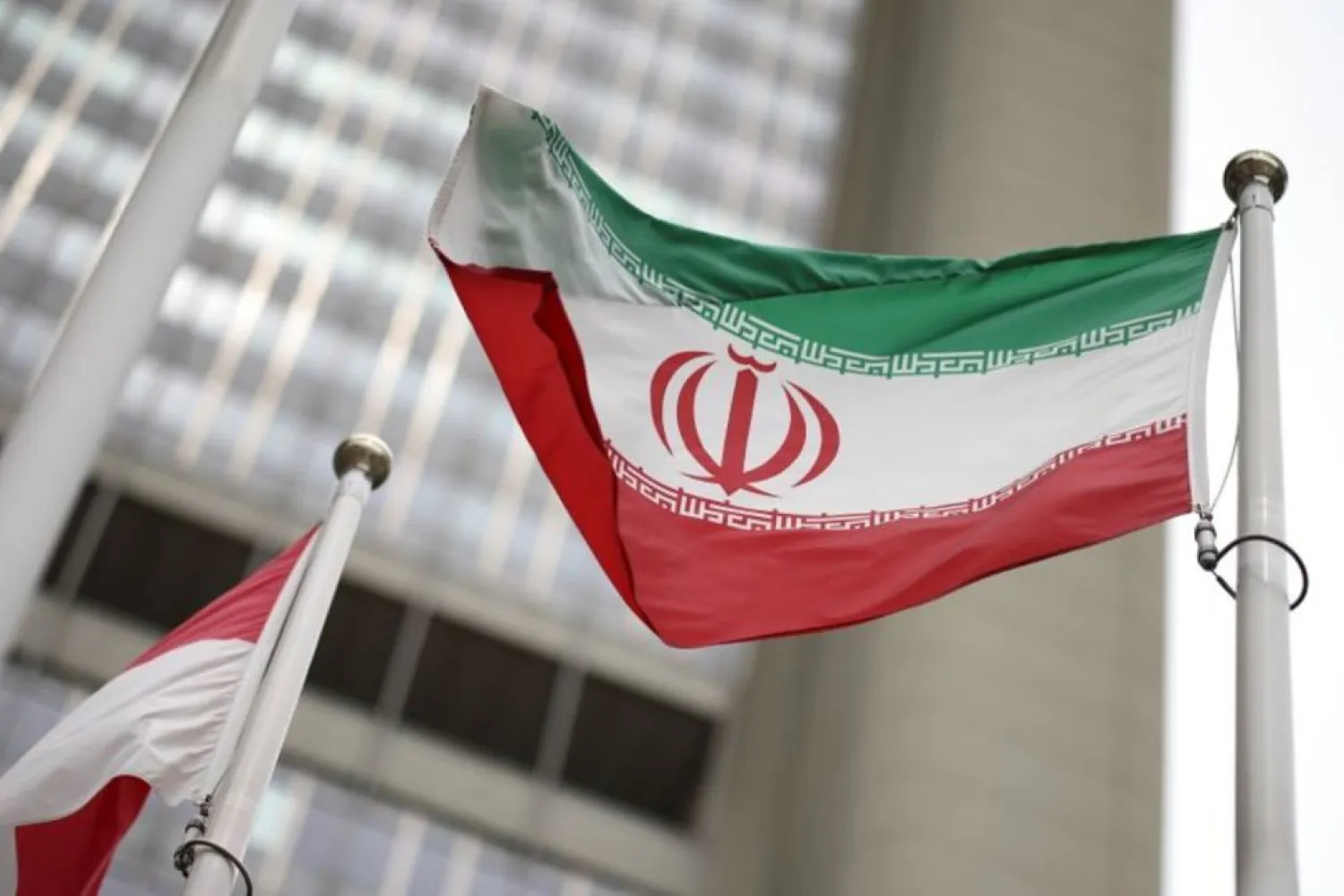 An Iranian flag flies in front of the UN office building, housing IAEA headquarters, amid the coronavirus disease (COVID-19) pandemic, in Vienna, Austria, May 24, 2021. (Reuters)