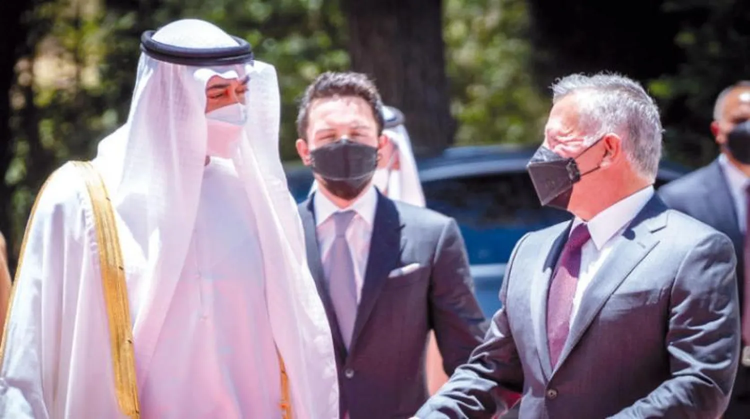  King Abdullah II and Sheikh Mohammed bin Zayed during the reception in Amman on Thursday, May 27, 2021. (Petra) 
