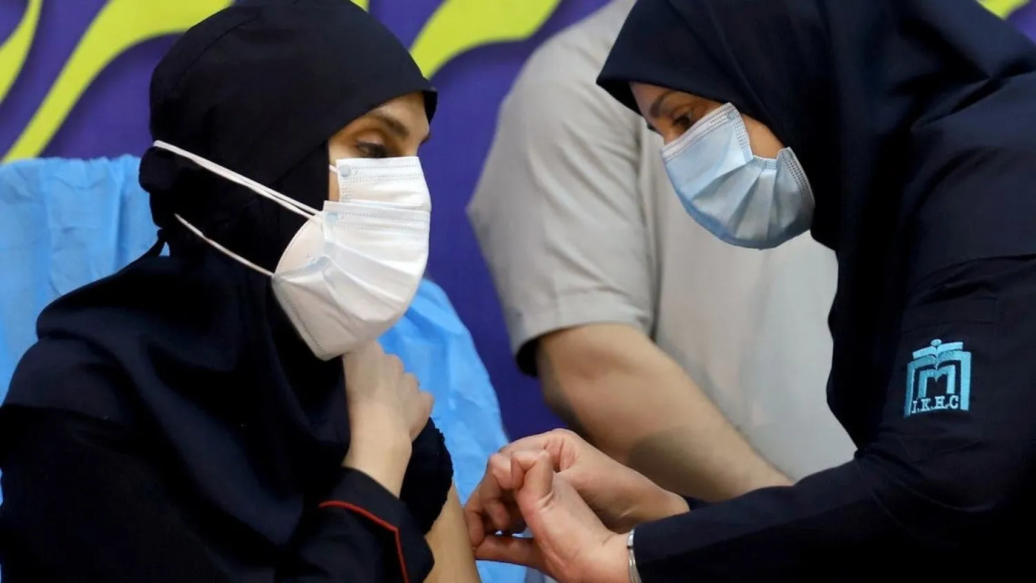 A member of the Imam Khomeini Hospital medical personnel receives a dose of Russia’s Sputnik V vaccine against the coronavirus disease (COVID-19), in Tehran, Iran February 9, 2021. (Reuters)
