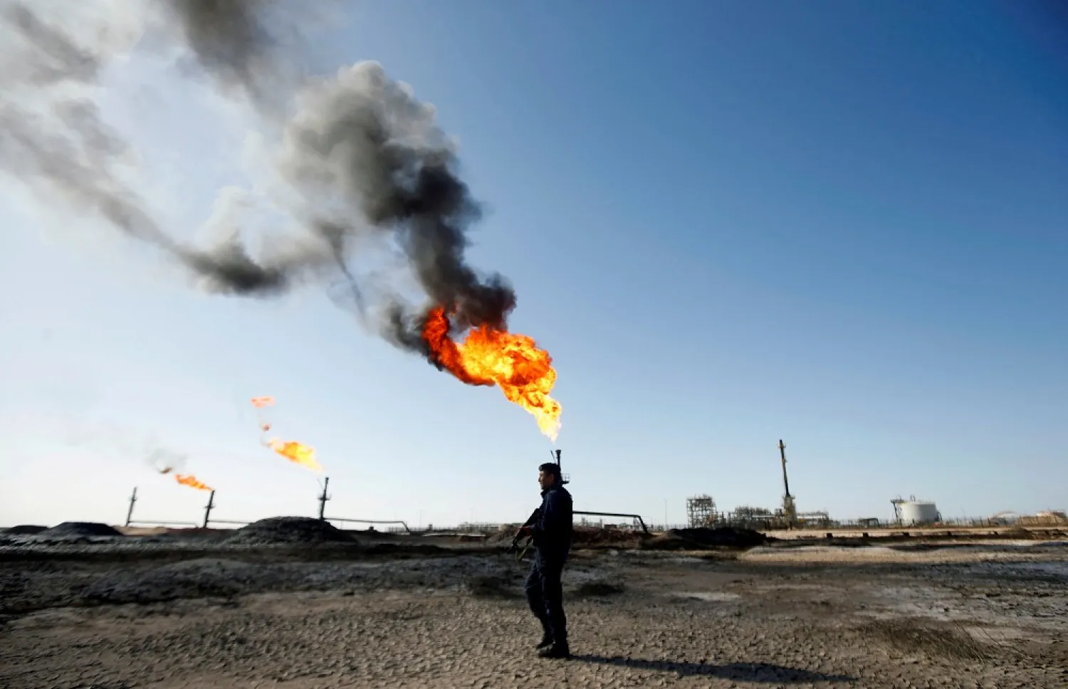 Iraq was hit hard by the collapse in oil prices when the COVID-19 pandemic struck and struggled to pay public sector workers. (Reuters)