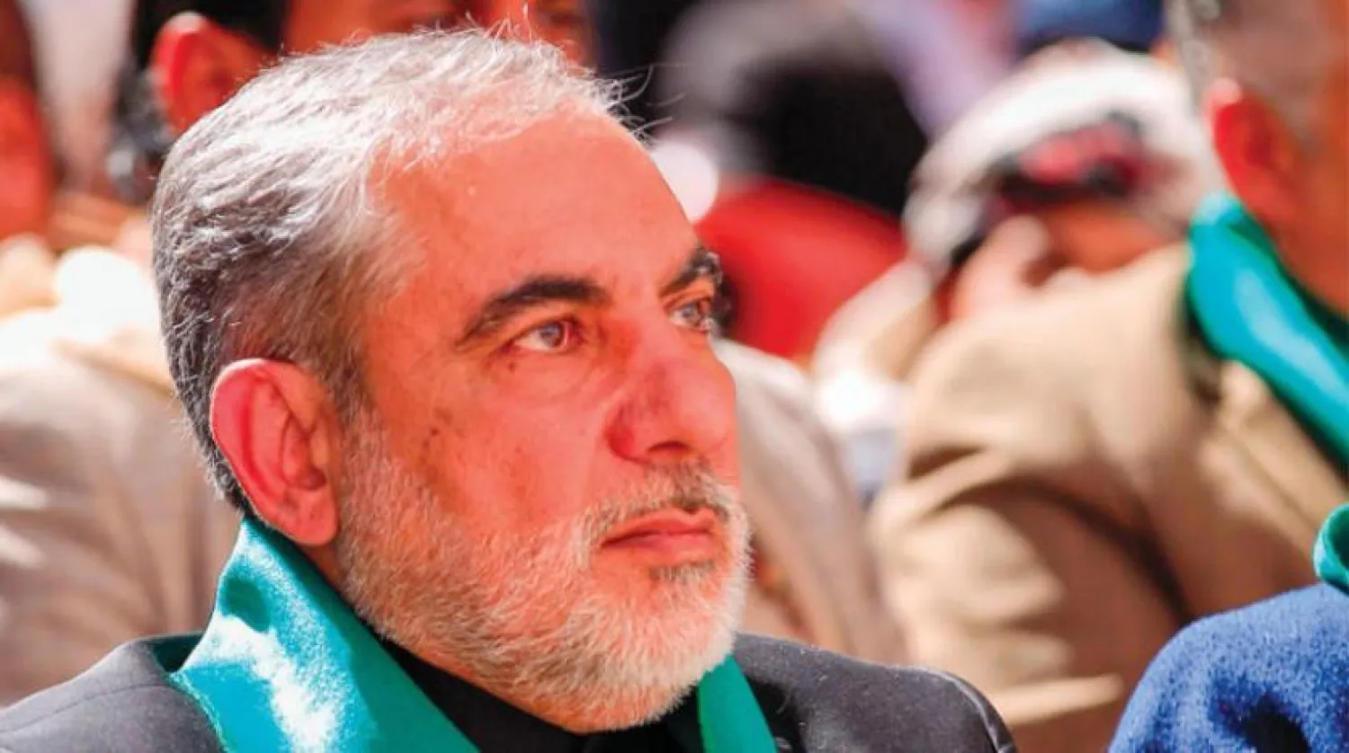 Iran’s so-called ambassador to Sanaa Hassan Eyrlou attending a Houthi rally. (AFP)