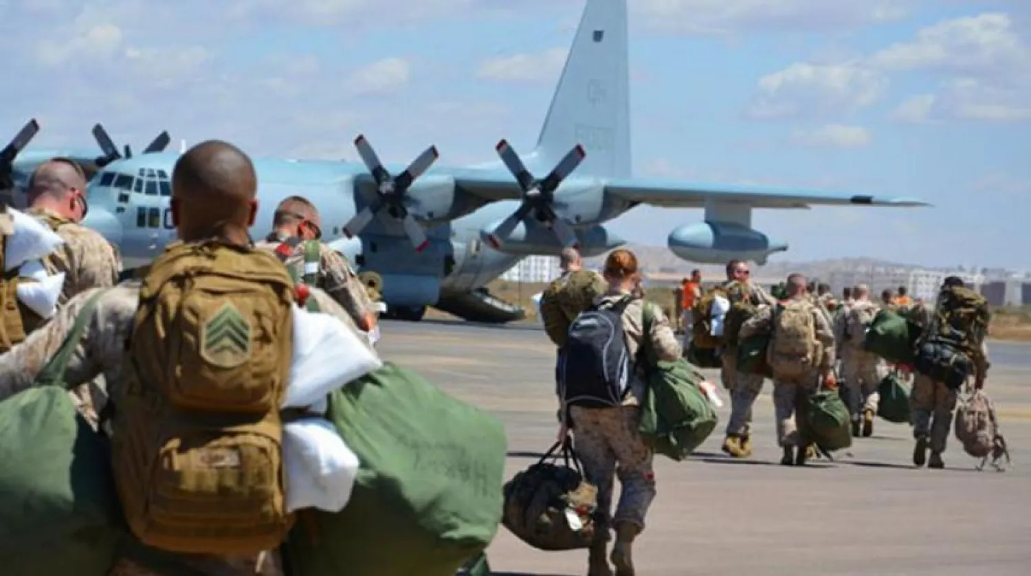 Members of the US Navy with the joint task force of the "African Lion" prepare to board a C-130 aircraft at Inezgane Airport in Morocco (AFRICOM)

