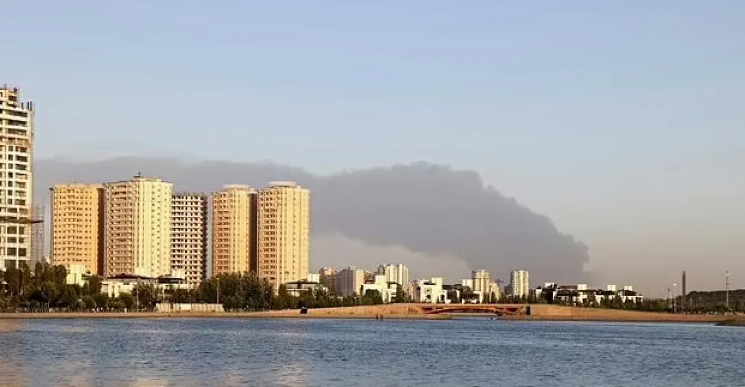 A picture taken on June 2, 2021, shows smoke billowing from the site of a refinery fire in the Iranian capital Tehran - AFP

