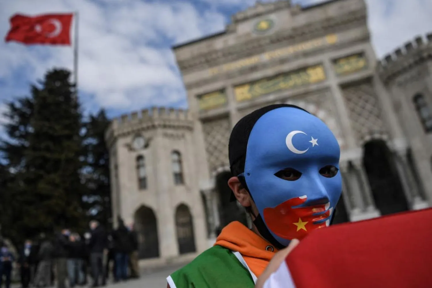 Çin'in Sincan bölgesinde iddia edilen zorunlu doğum kontrol önlemlerine karşı Türkiye'de düzenlenen bir protesto (AFP)

