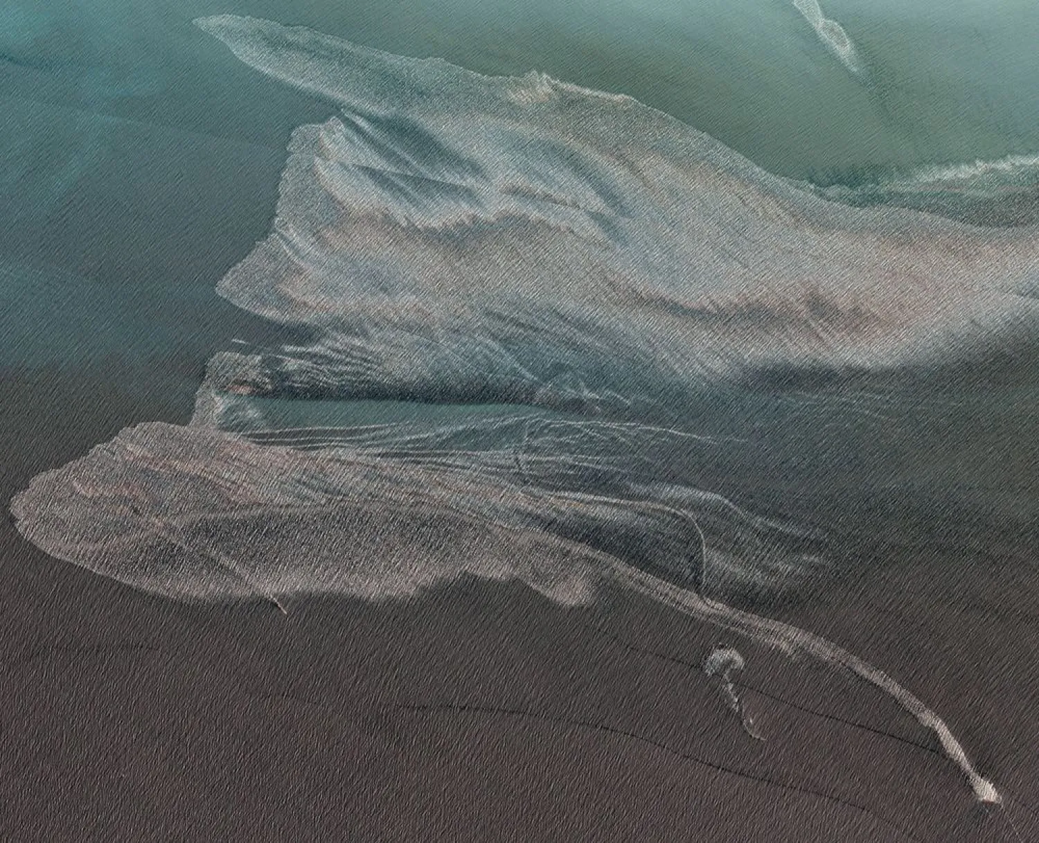 Oil-slicked waters spread out from the partially sunk Iranian navy vessel Kharg in the Gulf of Oman off the coast of Jask, Iran, in this Thursday, June 3, 2021, satellite photo from Planet Labs Inc. (Planet Labs Inc. via AP)
