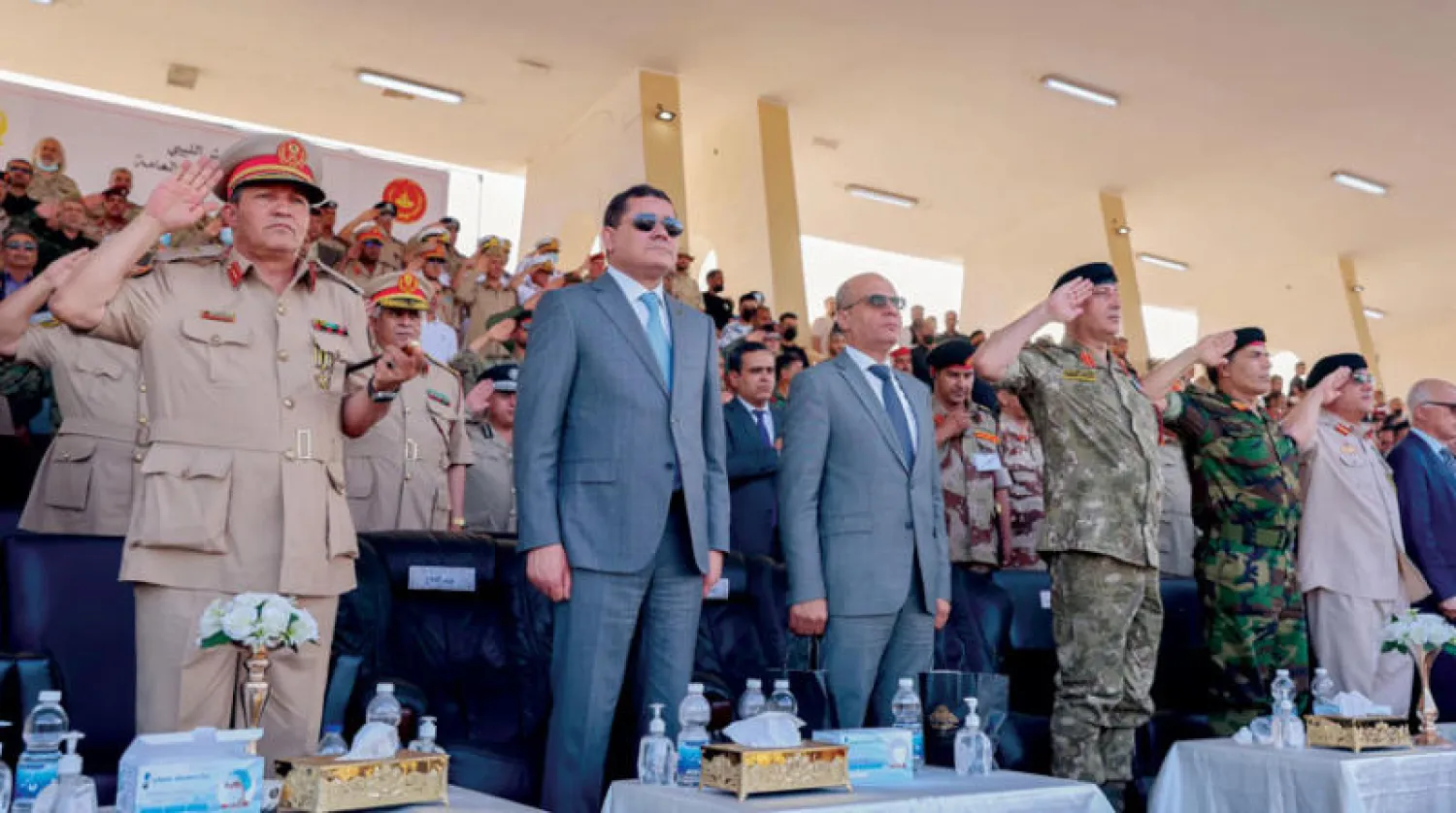 الدبيبة واللافي في حفل التخرج (حكومة الوحدة الوطنية)