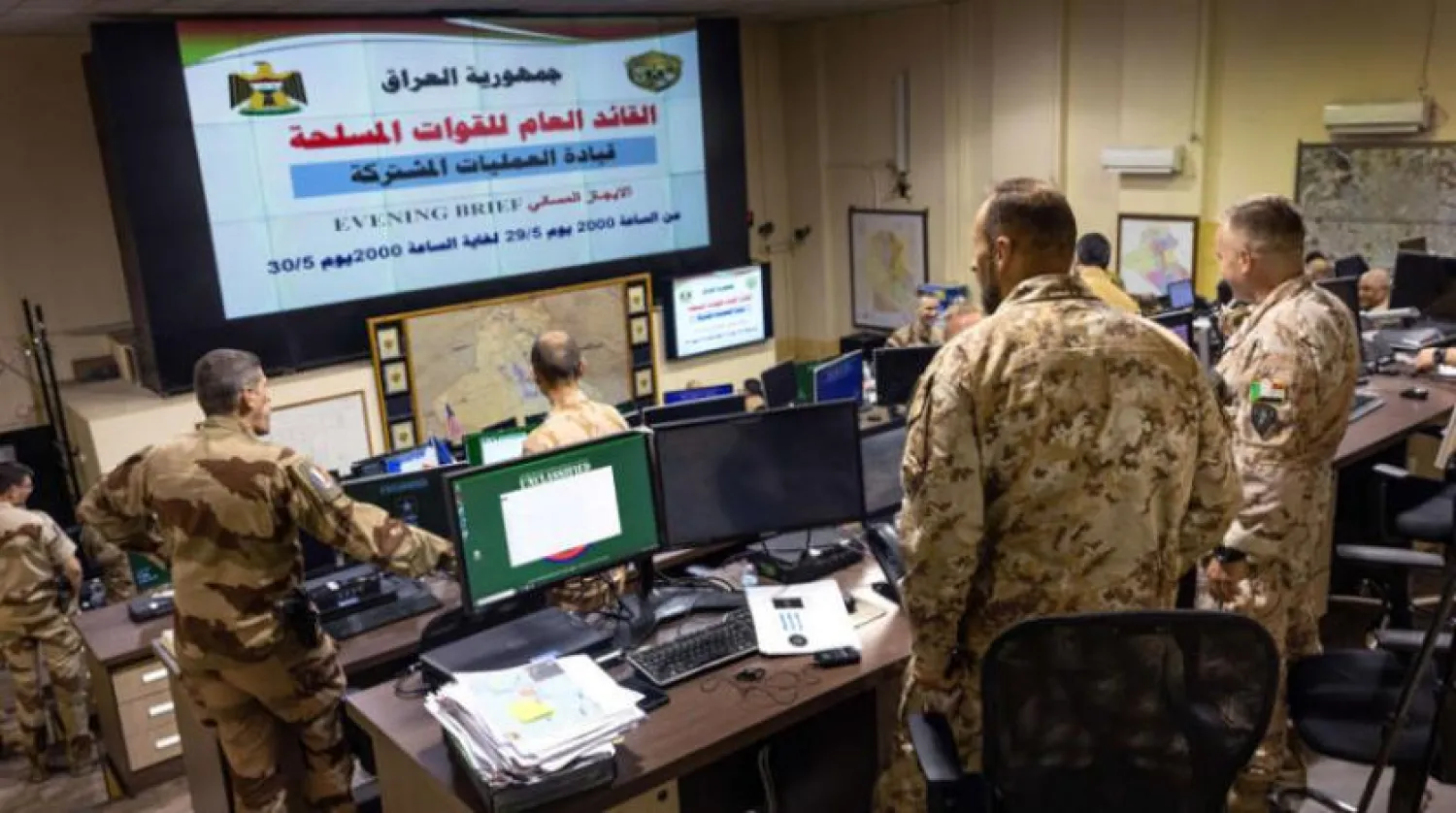 Uluslararası Koalisyon yetkilileri, Bağdat’ta güvenlik bölgesinde bir toplantıda (AFP)