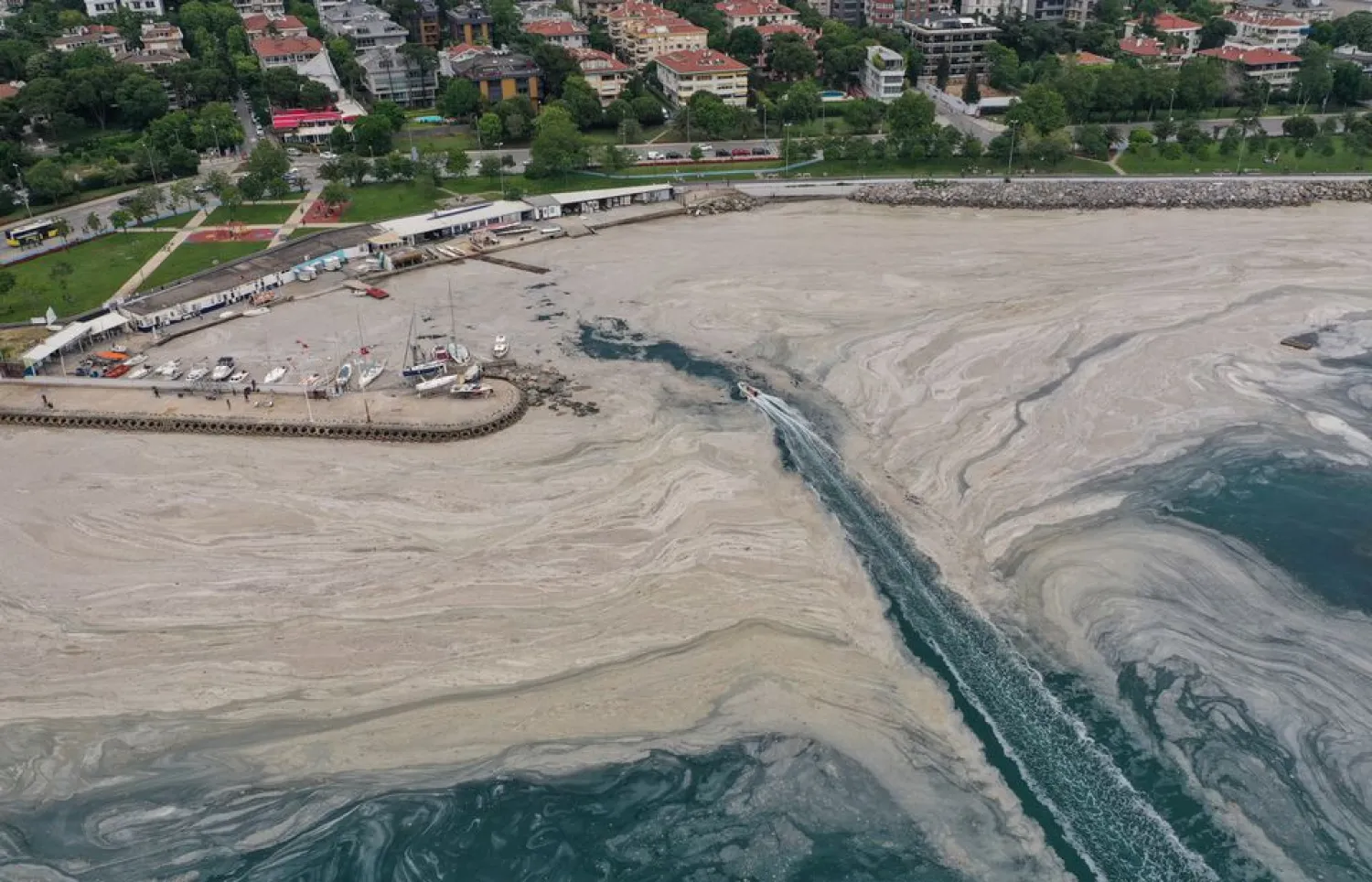 Drone footage shows “sea snot”, a thick slimy layer of the organic matter, also known as marine mucilage, spreading through the Sea of Marmara, on the shores of Istanbul, Turkey June 7, 2021. (Reuters)