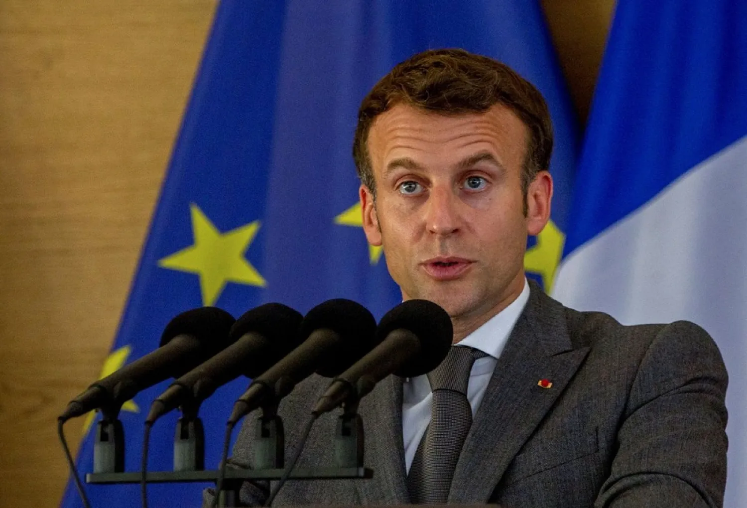 French President Emmanuel Macron speaks as he attends a joint news conference with Rwandan President Paul Kagame at the Presidential Palace in Kigali, Rwanda May 27, 2021. (Reuters)