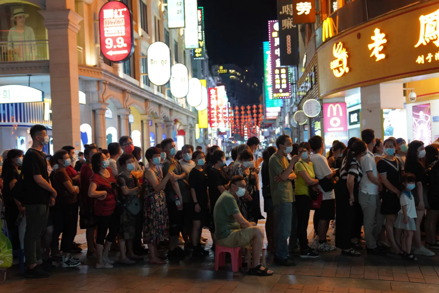 Residents line up for coronavirus testing in the Liwan District in Guangzhou in southern China's Guangdong province on Wednesday May 26, 2021. AP
