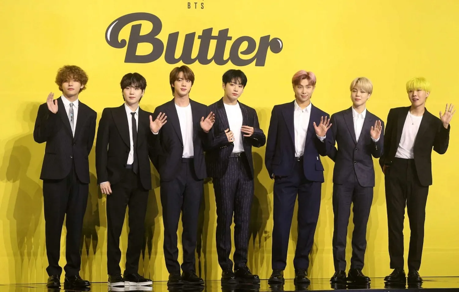 Members of South Korean K-pop boy band BTS pose for photographs during a press conference to promote their new single album “Butter” in Seoul on May 21, 2021. (AFP)