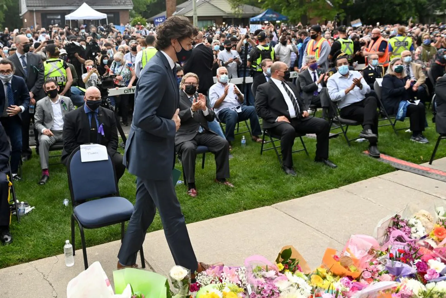 Canadian Prime Minister Justin Trudeau prepares to speak at a vigil outside the London Muslim Mosque organized after four members of a Canadian Muslim family were killed in what police describe as a hate-motivated attack in London, Ontario, Canada, June 8, 2021. Nathan Denette/Pool via REUTERS