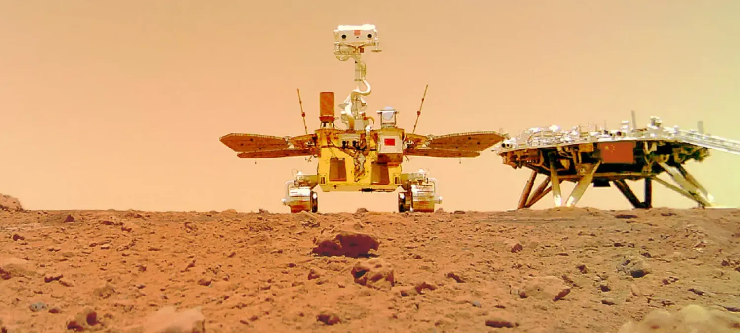 The Zhurong rover, named after a mythical Chinese fire god, has been studying the topography of a vast Martian lava plain known as the Utopia Planitia - AFP