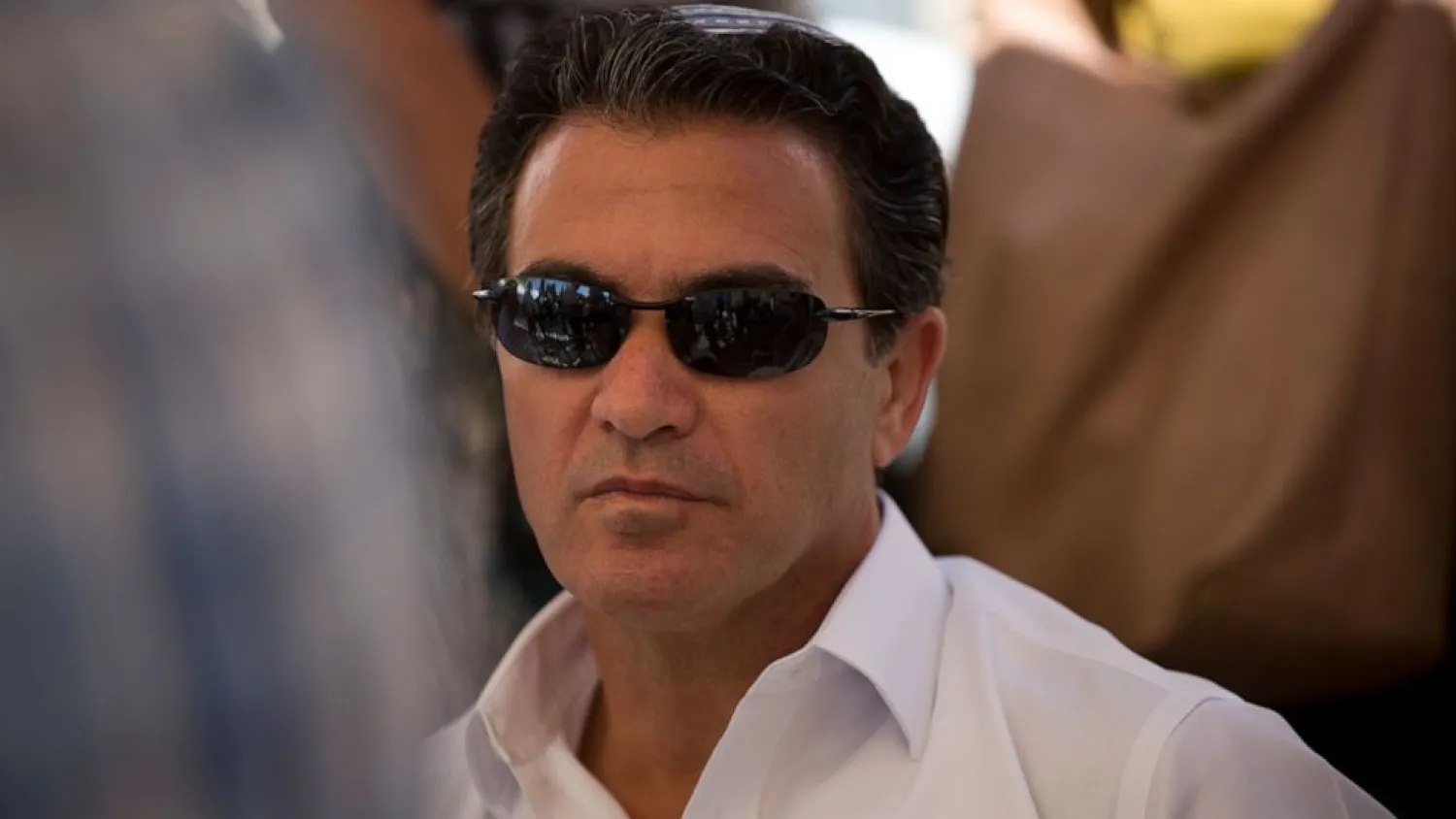 FILE - In this July 3, 2016, file photo, Yossi Cohen, then the director of Israel's Mossad intelligence agency, attends the funeral in Jerusalem of a rabbi killed by Palestinian gunmen. (AP Photo/Oded Balilty, File)
