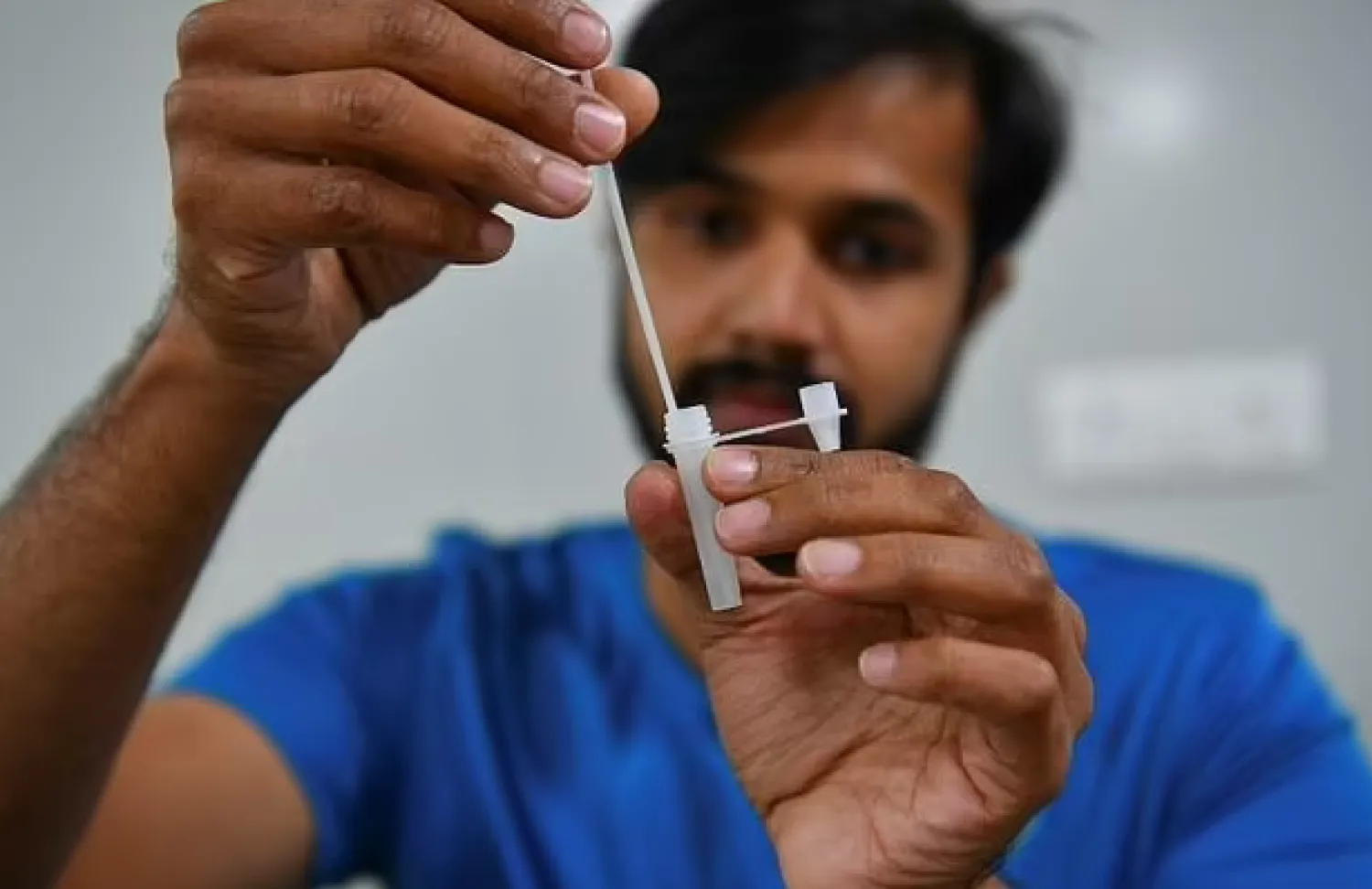 CoviSelf, launched earlier this month, is the first testing kit to be approved in India, which is slowly emerging from a brutal second wave that overwhelmed its hospitals and crematoriums - AFP

