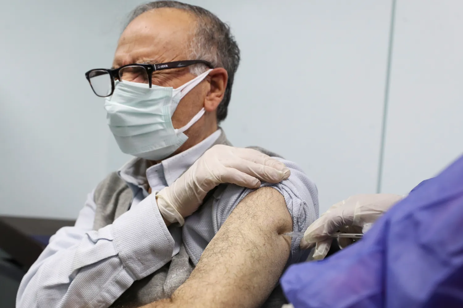 A man receives a dose of the AstraZeneca vaccine against the coronavirus disease in Cairo (Reuters)
