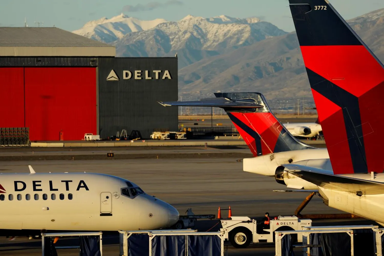 FILE PHOTO - A Delta Air Lines flight is pushed put of its gate at the airport in Salt Lake City, Utah, U.S., January 12, 2018. REUTERS/Mike Blake