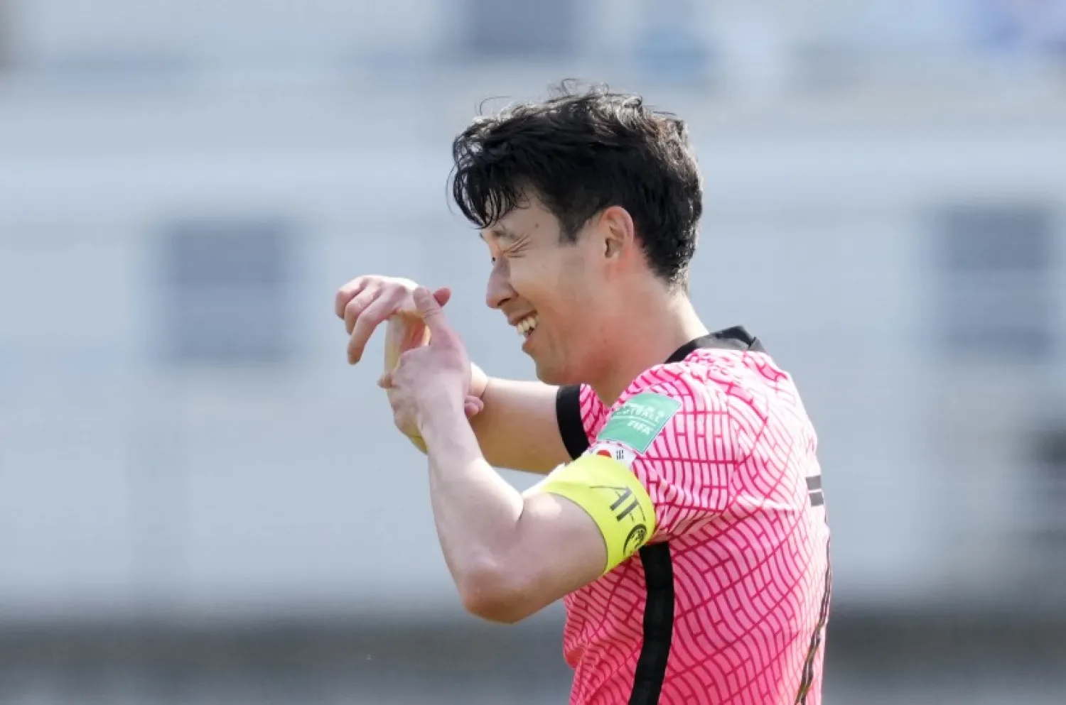 South Korea’s Son Heung-min celebrates after scoring his side’s second goal against Lebanon during their qualifying match for the World Cup at Goyang stadium in Goyang, South Korea, June 13, 2021. (AP)