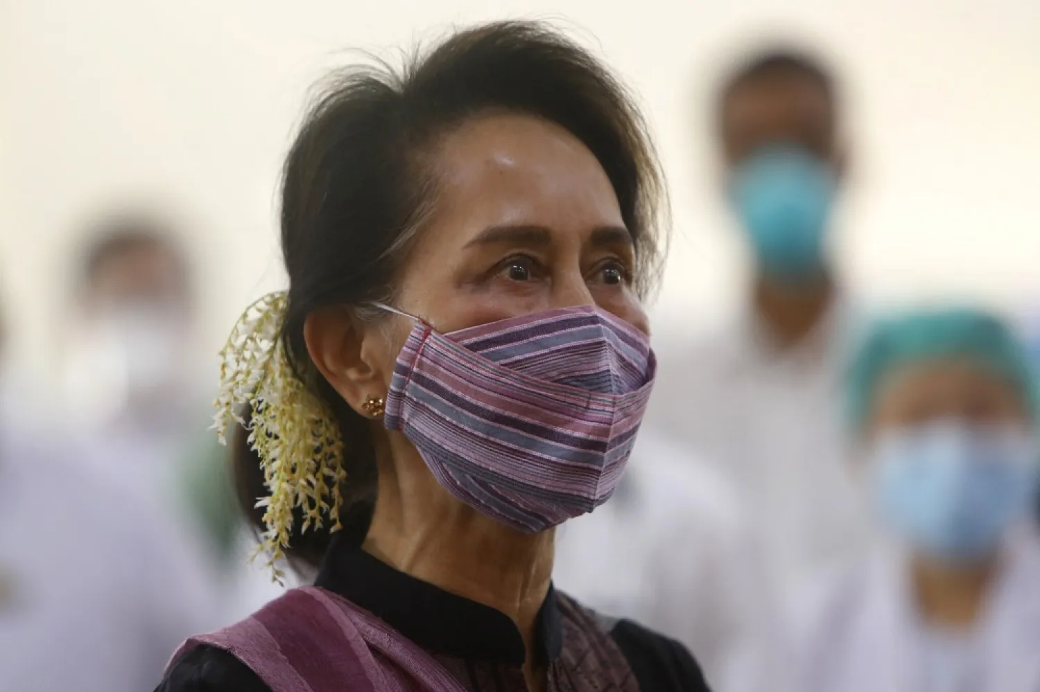 Myanmar leader Aung San Suu Kyi watches the vaccination of health workers at hospital Wednesday, Jan. 27, 2021, in Naypyitaw, Myanmar. (AP)