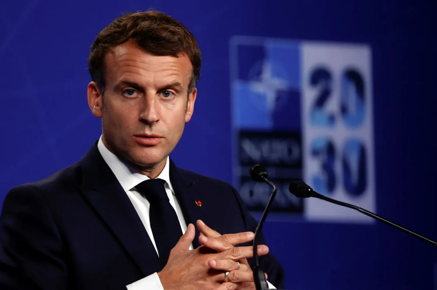 France's President Emmanuel Macron holds a news conference during the NATO summit in Brussels, Belgium June 14, 2021. (Reuters)