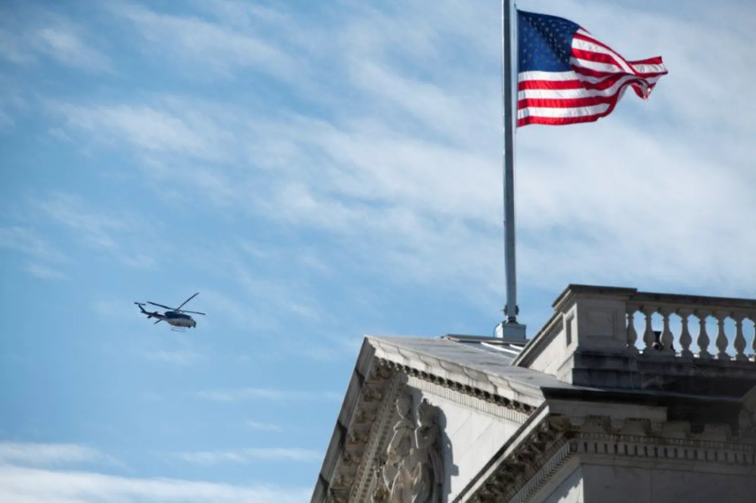 A helicopter flies above the US Capitol during the dress rehearsal ahead of US President-elect Joe Biden's inauguration in Washington, US, January 18, 2021. Rod Lamkey/Pool via REUTERS/File Photo




