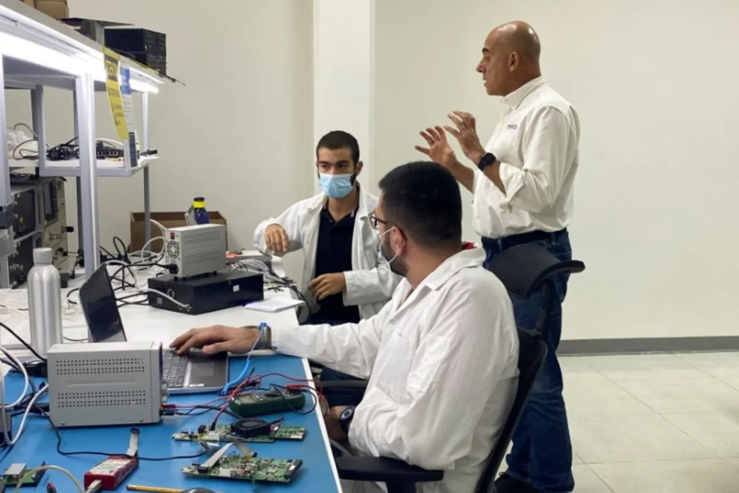 Lebanese entrepreneur Fadi Daou gestures as he talks with Multilane company's staff at Houmal technology park in Houmal, Lebanon June 11, 2021. (Reuters)