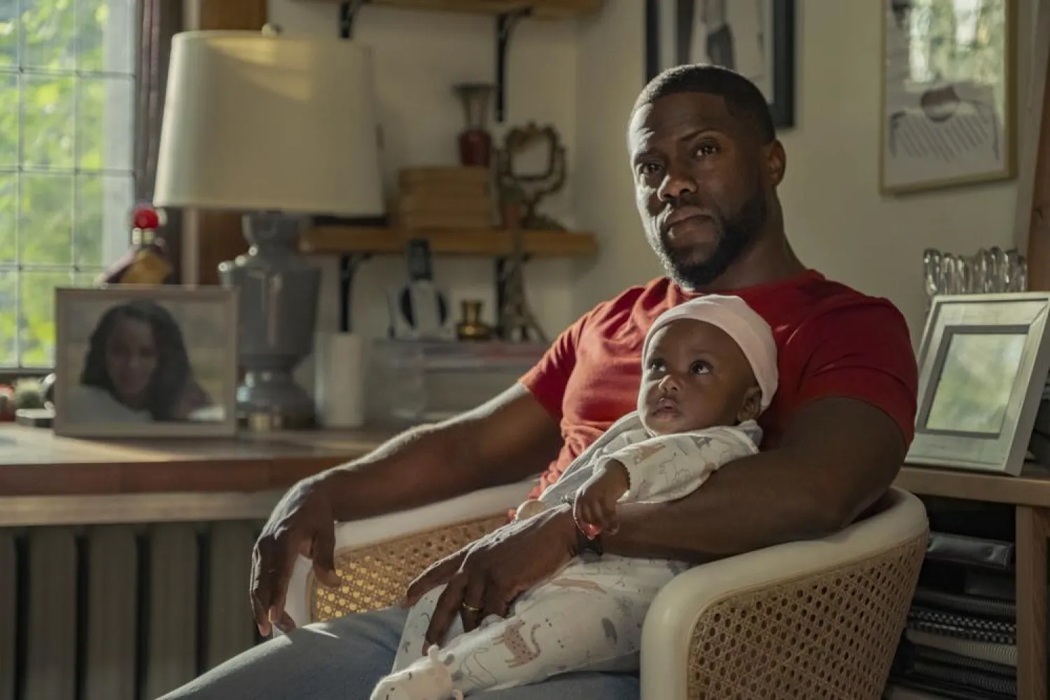 This image released by Netflix shows Kevin Hart in a scene from “Fatherhood.” (Netflix via AP)