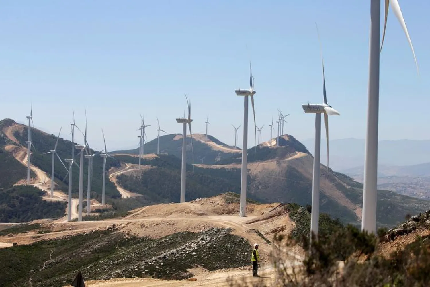 Saudi ACWA Power-generating windmills are pictured in Jbel Sendouq, on the outskirts of Tangier, Morocco, June 29, 2018. REUTERS/Youssef Boudlal/File Photo

