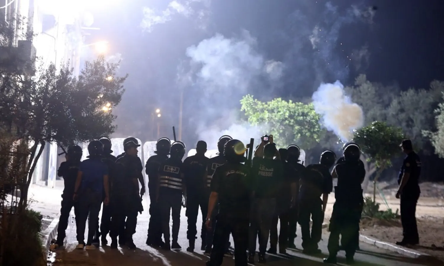 Security forces deployed during a protest in the Sidi Hassine suburb of Tunis, Tunisia. (EPA0