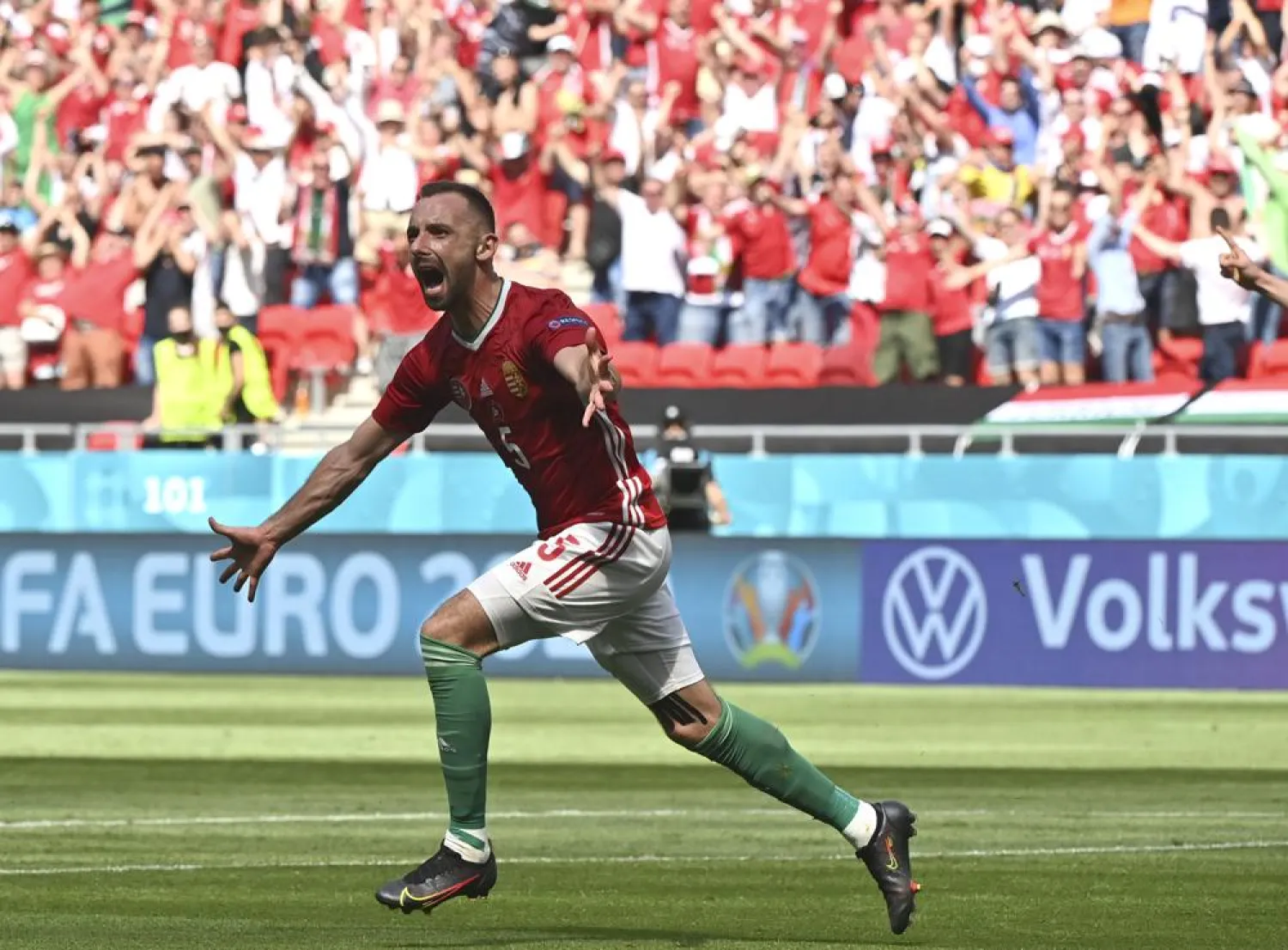Hungary's Attila Fiola celebrates after scoring his sides first goal during the match. (AP)