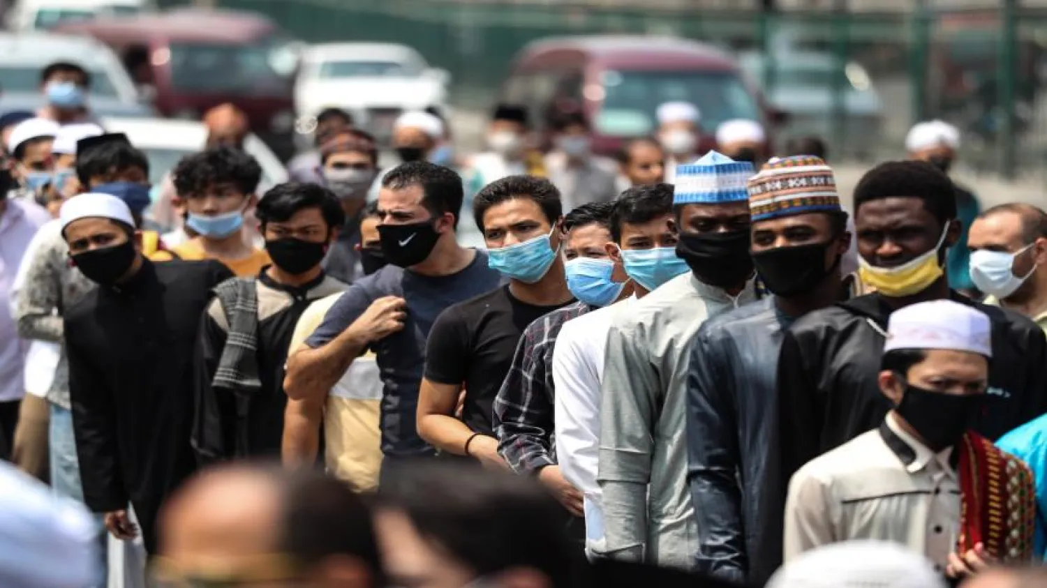Worshippers wait outside Al-Azhar Mosque as they arrive to perform the Friday prayers under coronavirus pandemic restrictions, Cairo, Egypt, Aug. 28, 2020. Mohamed El-Shaded/AFP 