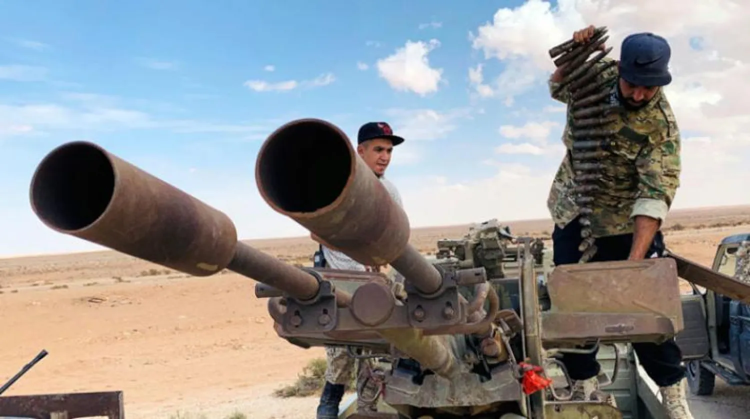 UMH’ye yakın milisler Ebu Gureyn bölgesinde devriye geziyor (Reuters)
