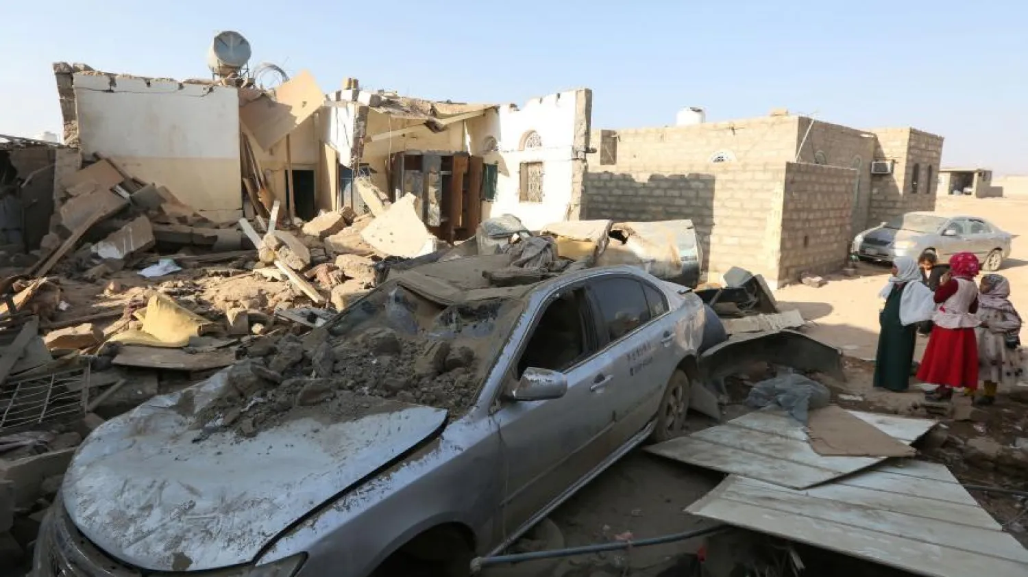 Car destroyed after the attack in Jawf, Yemen (Reuters)
