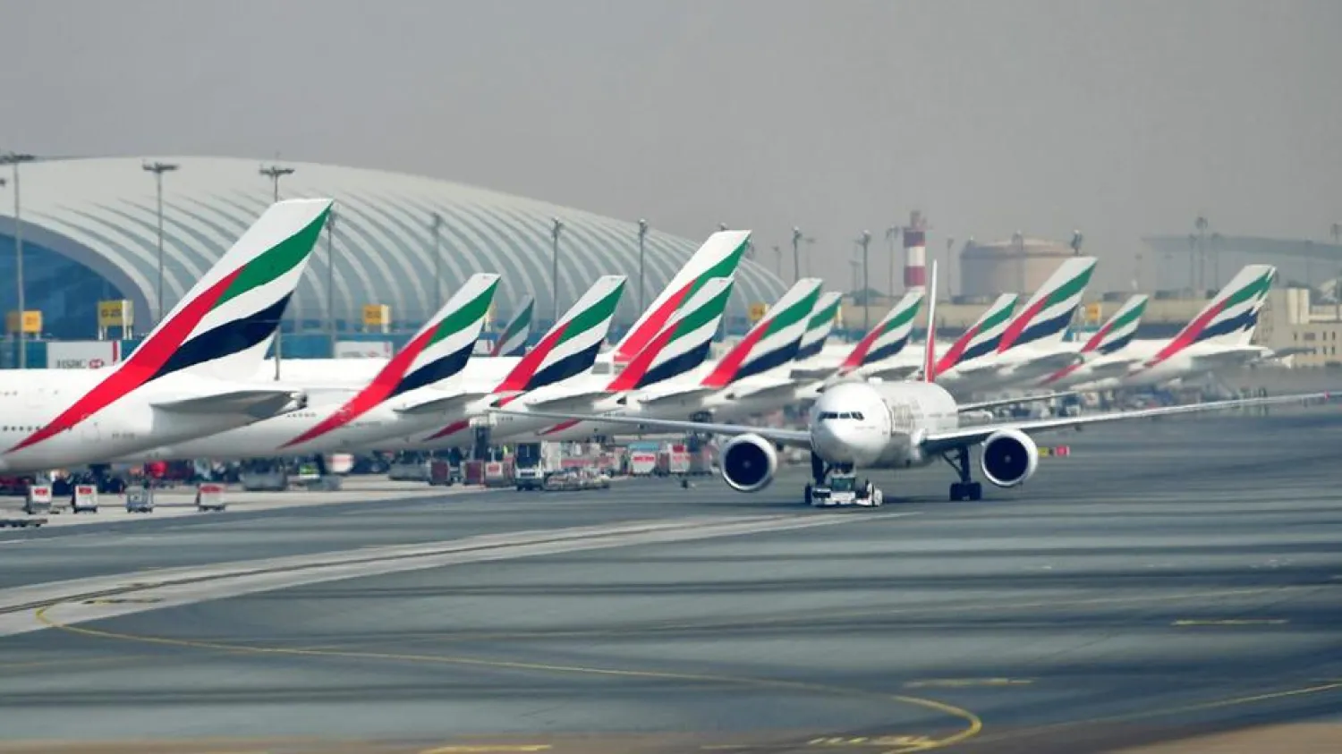 Emirates planes parked at the tarmac at Dubai International Airport. (AFP)