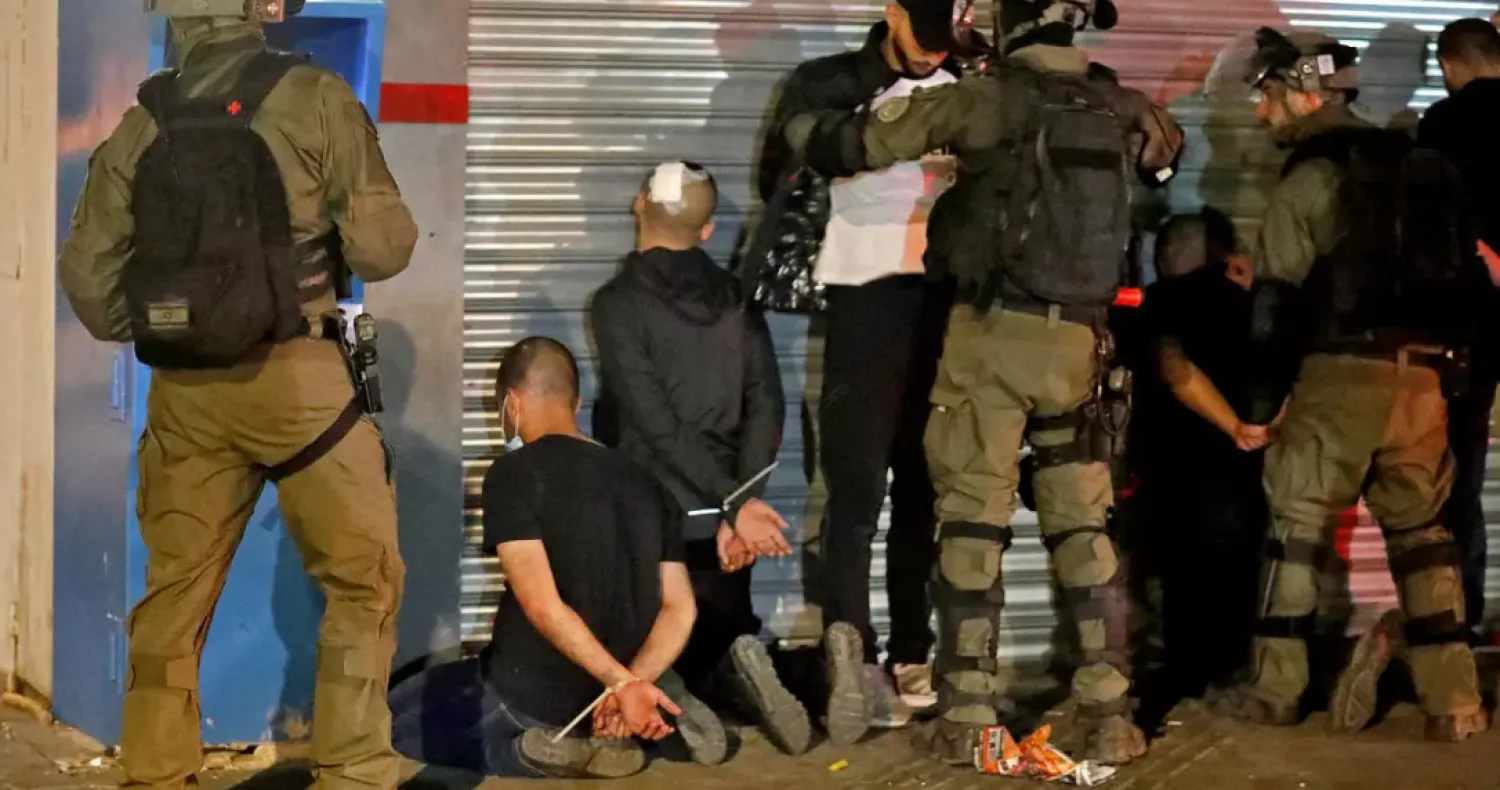 Israeli police made dozens of arrests in the mixed Jewish-Arab city of Lod when deadly intercommunal violence erupted during last month's Gaza conflict - AFP