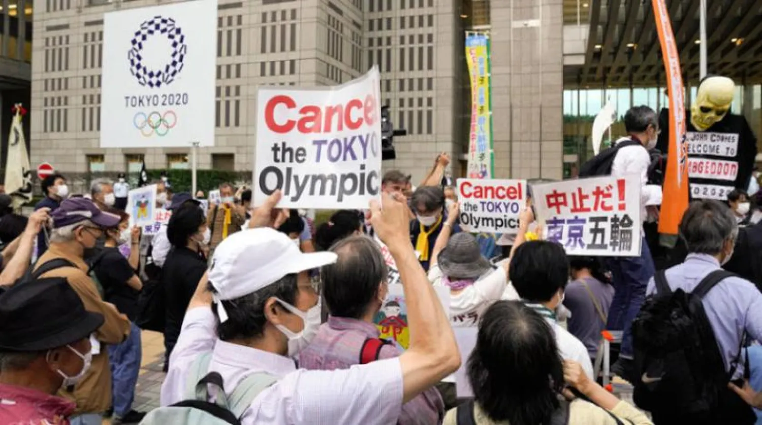 Dün (Çarşamba) Tokyo Olimpiyat Oyunlarına karşı yapılan bir gösteri. (EPA)