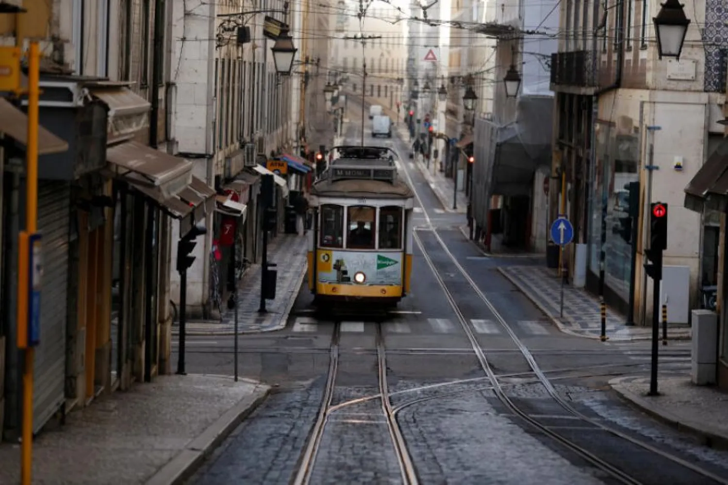 A tram is pictured on the empty street in Lisbon, Portugal, on Oct 31, 2020. (Reuters)