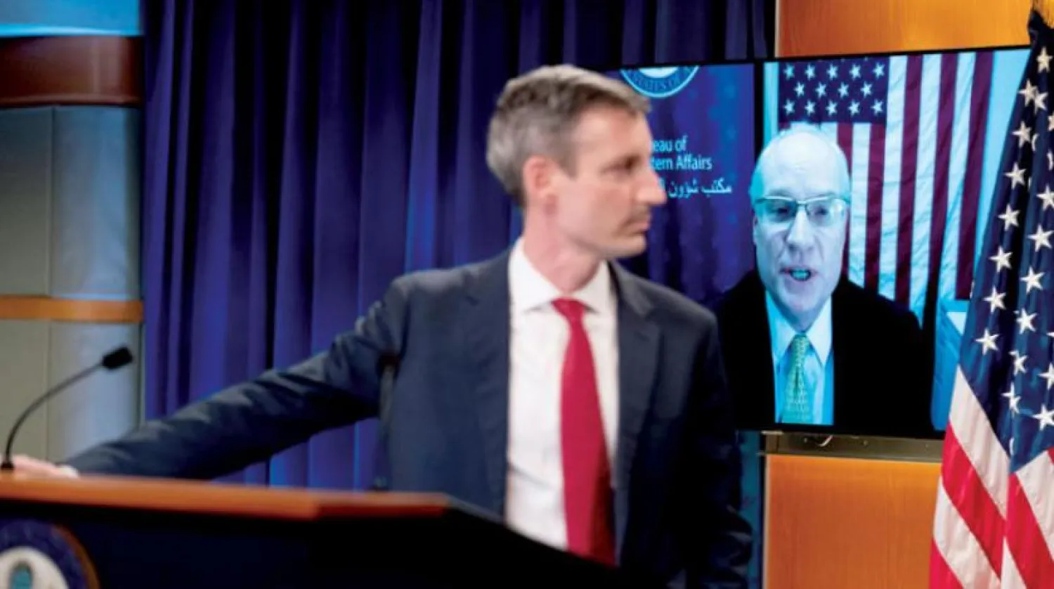 The US envoy appears on the screen during a State Department press briefing. (Reuters file photo)