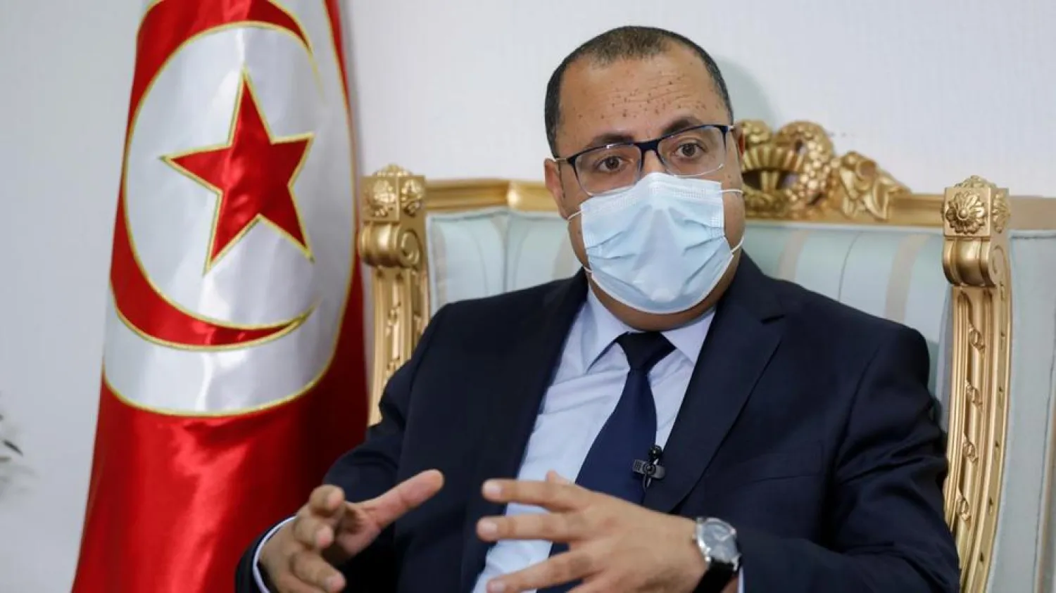 Tunisian Prime Minister Hichem Mechichi speaks during an interview with Reuters in Tunis, Tunisia April 30, 2021. (Reuters)