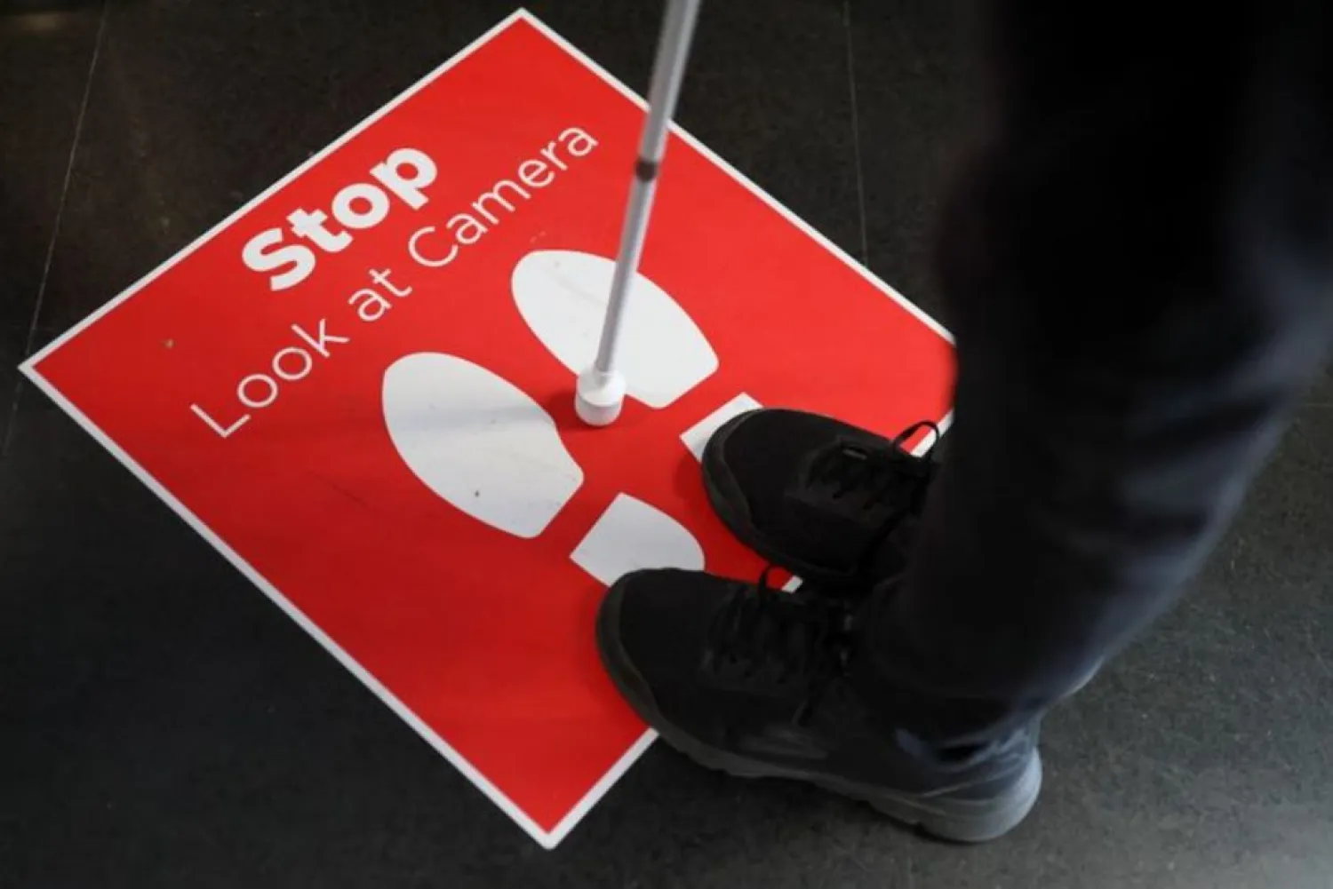Blind Turkish entrepreneur Kursat Ceylan, 35, cofounder of Wewalk technology, uses his smart cane, as he arrives at the Mobile World Congress (MWC) in Barcelona, Spain, June 29, 2021. (Reuters)