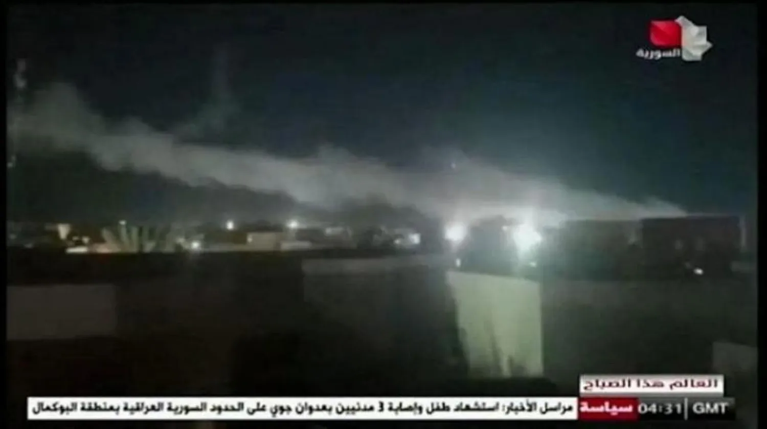 An image from Syrian state television shows smoke rising after US air strikes on the Syrian-Iraqi border. (AFP)