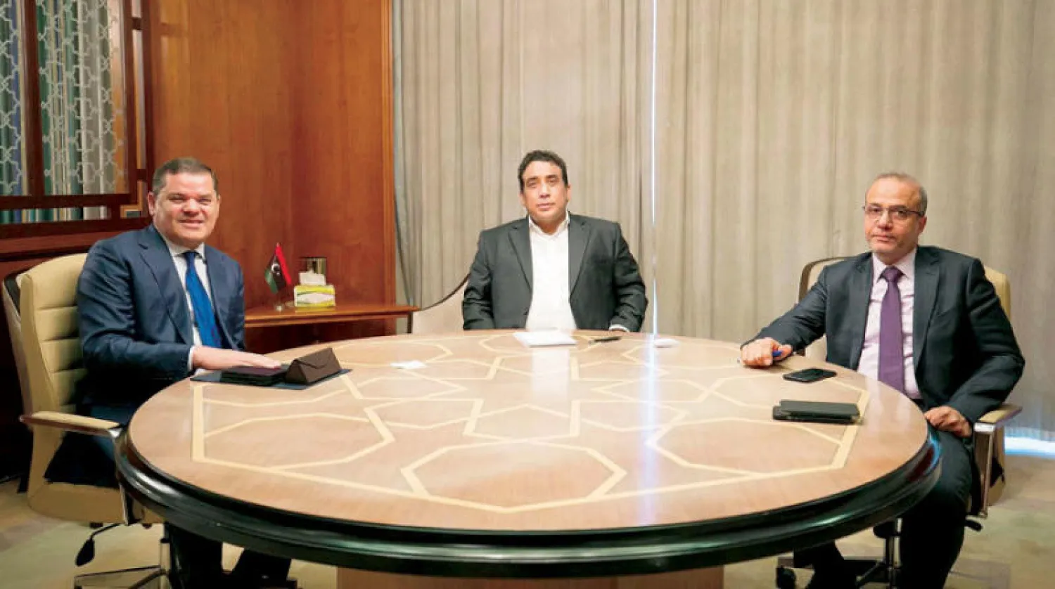 المنفي واللافي خلال اجتماعهما مع الدبيبة (المجلس الرئاسي الليبي)