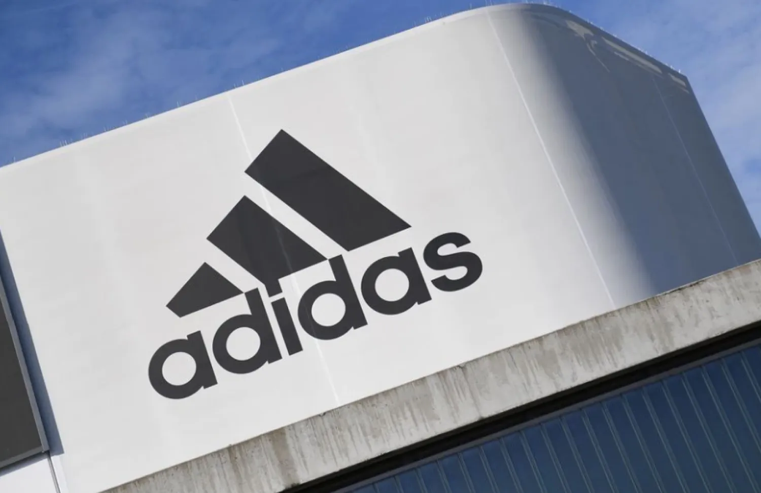 The Adidas logo is pictured during celebrations for German sports apparel maker Adidas' 70th anniversary at the company's headquarters in Herzogenaurach, Germany, August 9, 2019. REUTERS/Andreas Gebert

