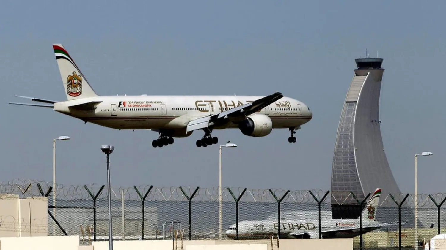 In this May 4, 2014 file photo, an Etihad Airways plane prepares to land at the Abu Dhabi airport in the United Arab Emirates. (File photo: AP)

