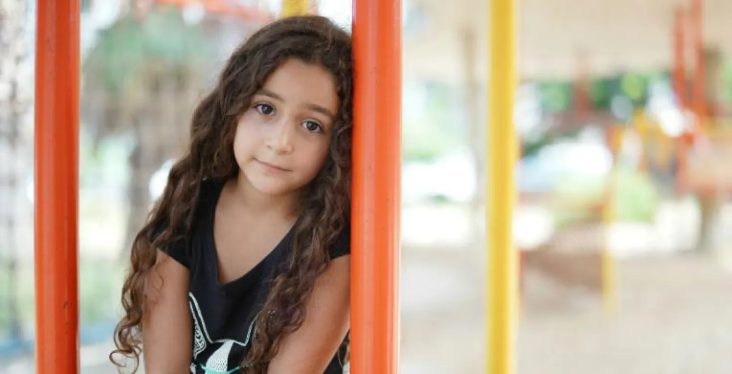
On 1 September 2020, 8-year old Hanan participates in UNICEF-supported psychosocial support activities at the Karantina public garden in Beirut, which was set up after the port explosion - UNICEF/2020/Choufany
