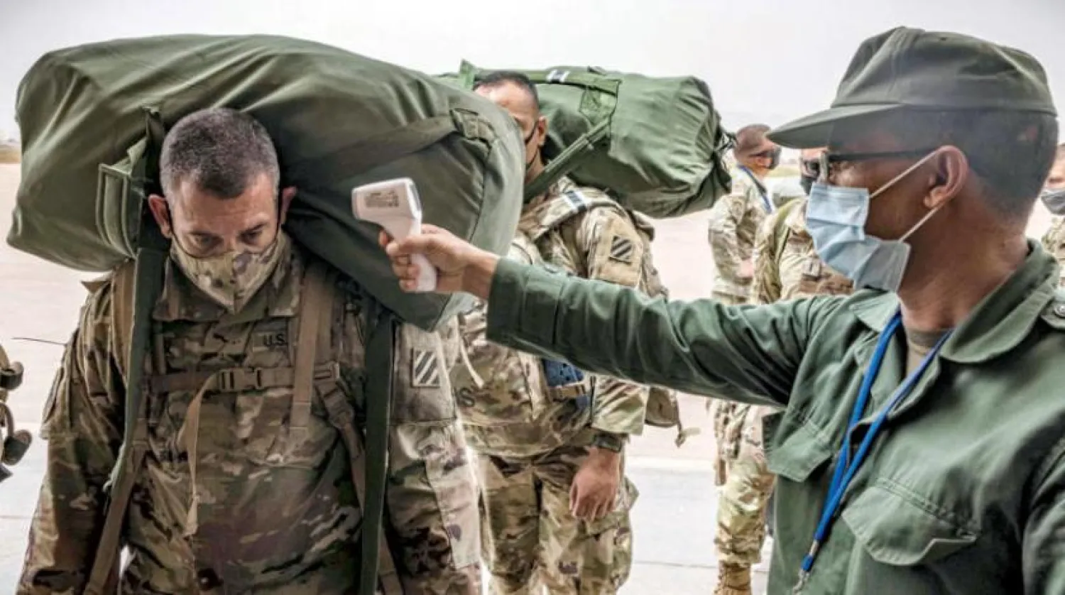 A US soldier gets his temperature checked after arriving in Morocco to participate in the "African Lion" exercise, June 9, 2021. AFP